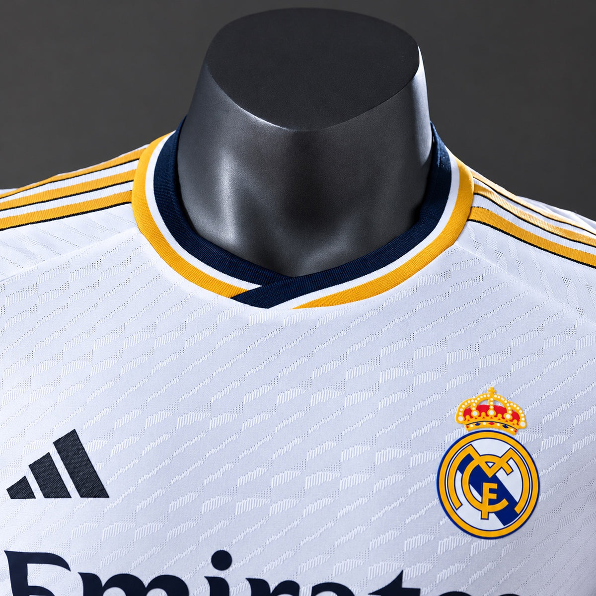 Real Madrid 2425 Home Jersey featuring the iconic crest and stylish collar design.